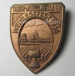 Commemorative, reddish-bronze-toned day-badge (ie. 'tinnie') as issued to...