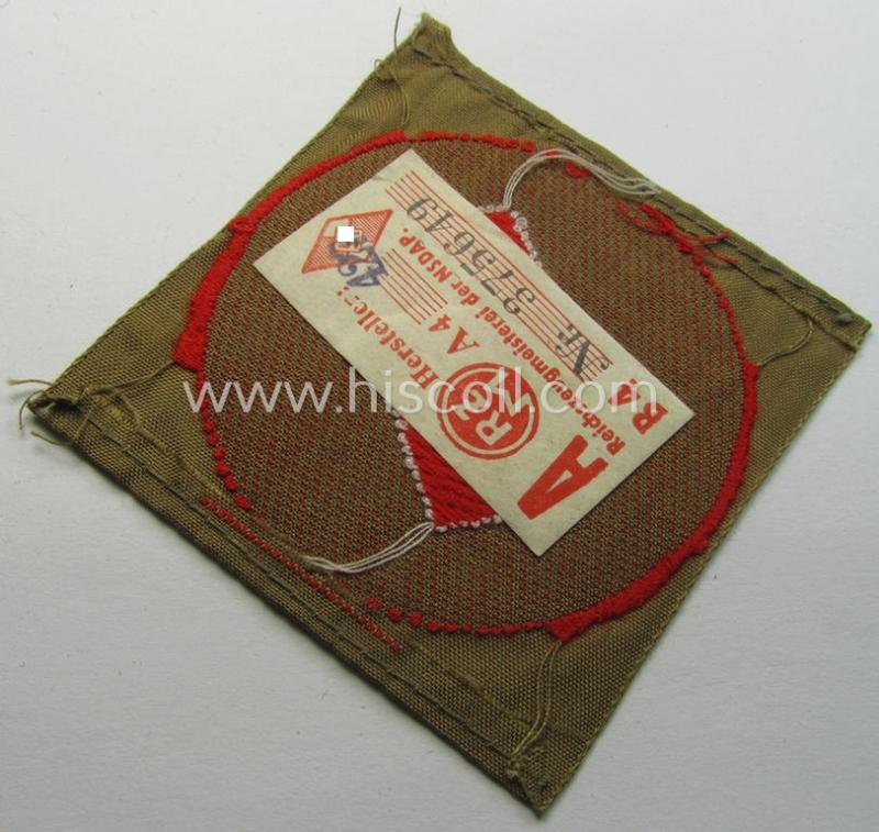 Attractive, DJ (ie. 'Deutsches Jungvolk') arm-badge as was intended for usage by a member who served within the: 'Oberbann 1' (being a 'virtually mint- ie. unissued' example that still retains its 'RzM'-etiket)