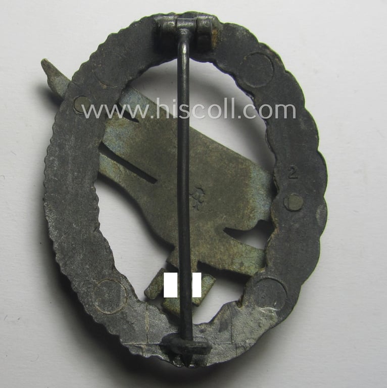 Superb, WH (Luftwaffe) 'Fallschirmschützen-Abzeichen' being a (typical and clearly!) maker- (ie. 'A'-) marked and 'Feinzink'-based example by the: 'Assmann & Söhne'-company that comes stored in its period etui