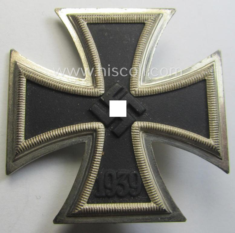 'Eisernes Kreuz 1. Klasse' (or: Iron Cross 1st class) being a typical maker- (ie. '65'-) marked example that was produced by the desirable 'Hersteller' named: 'Klein & Quenzer A.G.'