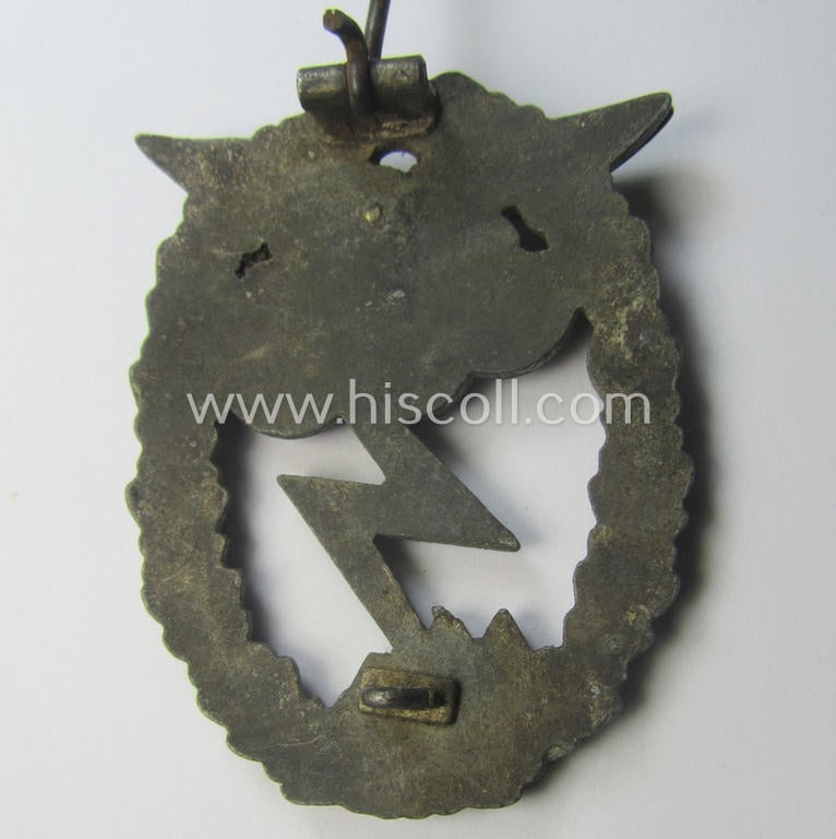 Mid- (ie. later-) war-period, zinc- (ie. 'Feinzink'-) based version of a WH (Luftwaffe) 'Erdkampfabzeichen' as was produced by the: 'J.E. Hammer u. Söhne'-company