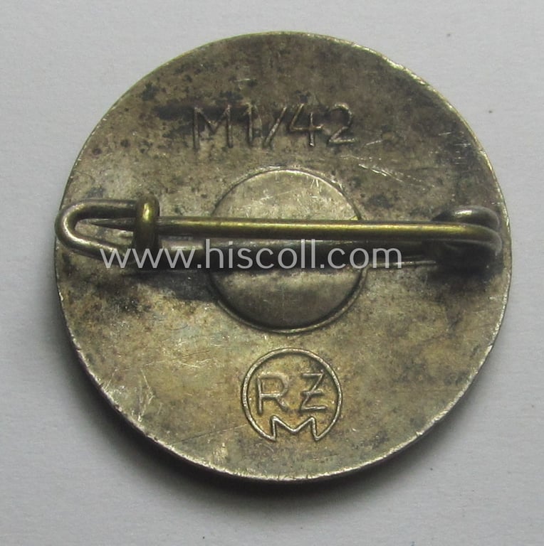 'N.S.D.A.P. - Parteiabzeichen' showing the makers'-designation: 'RzM' and/or: 'M1/42' (= 'Kerbach & Israel - Dresden')