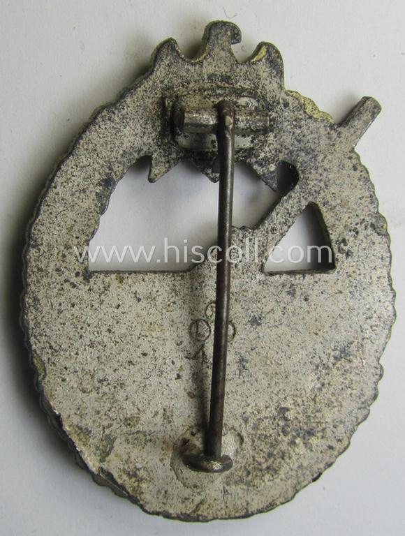 WH (KM) 'Marine-Artillerie-Abzeichen' being a maker- (ie. 'F.L.L. - 43'-) marked- and/or zinc- (ie. 'Feinzink'-) based example by the: 'Friedrich Linden'-company