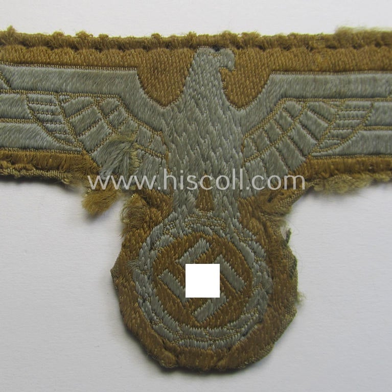 WH (Heeres) 'tropical-issue' (ie. DAK or: 'Deutsches Afrika Korps'-related-) breasteagle as executed in neat so-called: 'BeVo'-weave style that comes in a clearly used- (ie. trimmed- and/or pre-confectioned-), condition