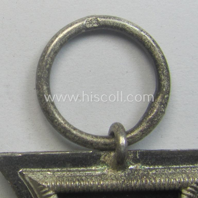 'EK II. Klasse' being a maker- (ie. '4'-) marked example that comes together with its original- and once-mounted ribbon (ie. 'Bandabschnitt') as was produced by the maker (ie. 'Hersteller'): 'Steinhauer u. Lück'