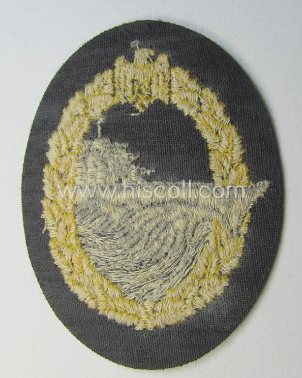 Attractive, WH (Kriegsmarine) 'Zerstörerkriegsabzeichen in Stoff' (ie. cloth-based destroyer war-badge) being a multi-coloured example that that is nicely machine-embroidered on darker-blue-coloured wool