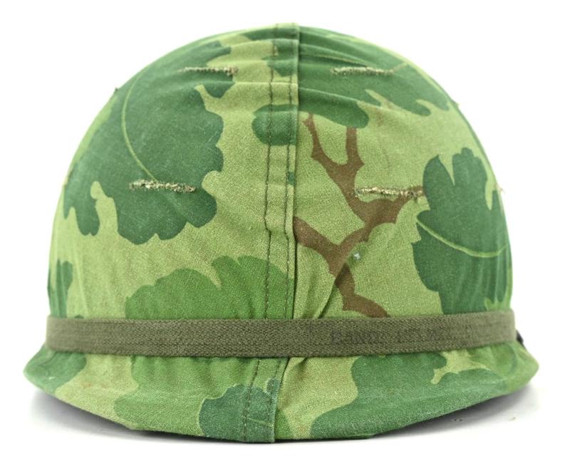 US Vietnam War Infantry helmet with camouflage cover and liner