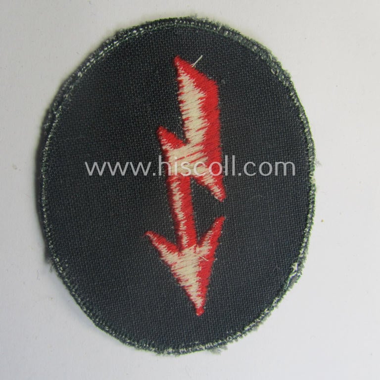 Thin-shaped- ie. 'variant'-pattern, WH (Heeres) trade- and/or special-career insignia ie. machine-embroidered signal-blitz (being a non-maker-marked example as executed in bright-red) as intended for the: 'Artillerie-Trpn.'