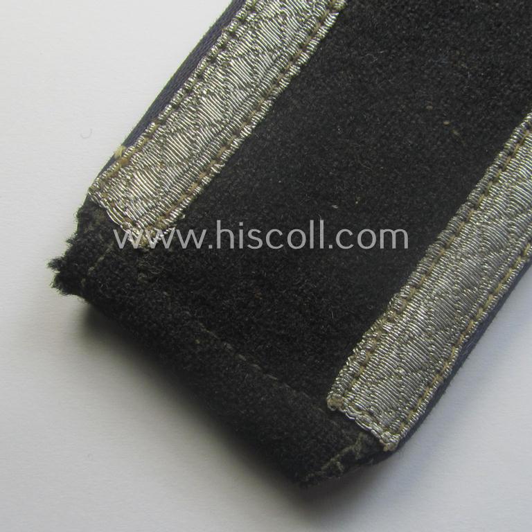 Single, Waffen-SS, NCO-type shoulderstrap as piped in the darker-blue-coloured branchcolour as was intended for usage by an: 'SS-Unterscharführer' who served within the: 'SS-Sanitäts-Trpn.'