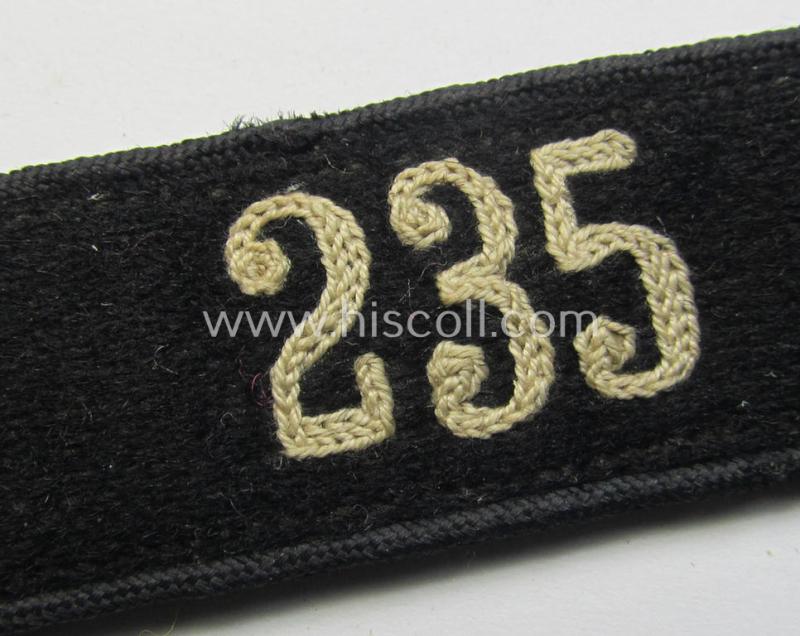 Neat - and naturally single! - black-piped 'DJ- o. Deutsches Jungvolk' shoulderstrap as was intended for usage by a: 'DJ-Mitglied' who served within the: 'Bann 235' (235 = 'Duisburg o. Duisburg-Süd')