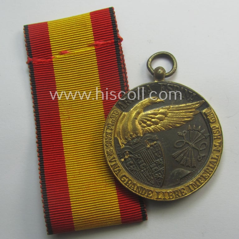 Spanish-issued, Spanish Civil-War commemorative-medal called: 'Medalla de la Campaña 1936-1939' that came together with its period piece of ribbon (ie. 'Bandabschnitt') as issued and/or recently found
