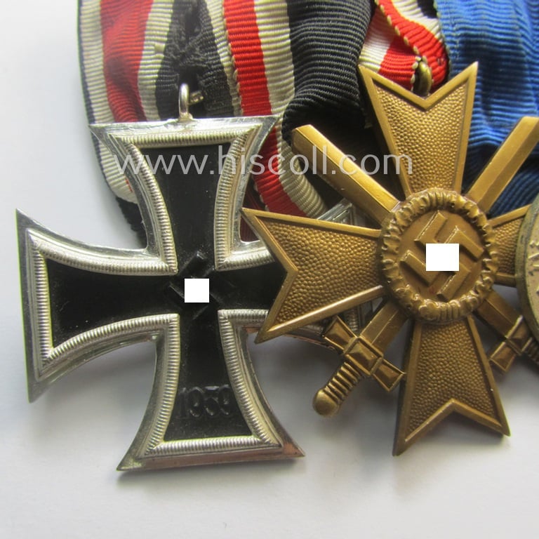 Superb, 4-pieced WH (LW) medal-bar (ie. 'Ordenspange')showing an: 'EK II.Kl.' (in the 'Schinkel'-pattern!), a: 'KvK II.Kl. mit Schw.', a: WH (LW) so-called: 'DA für 4 Jahre t. Dienste' and a: WH Czech 'Anschluss'-medal: '1. Oktober 1938'