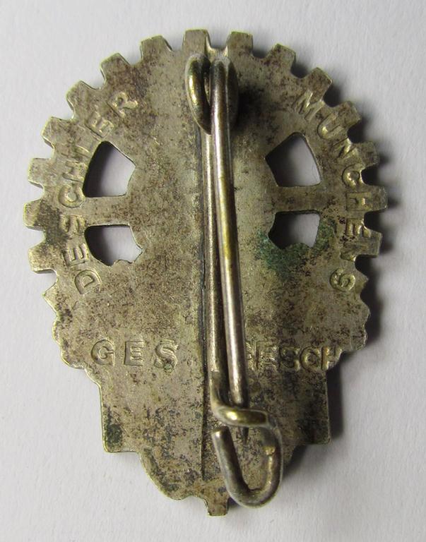 Silver-toned membership lapel-pin (or: 'Mitgliedsabzeichen') aka: 'Mitgliedsabzeichen des Gesamtverbands deutscher Arbeitsopfer (GDAO)' being a nicely maker- (ie. 'Deschler u. Söhne'-) marked, example