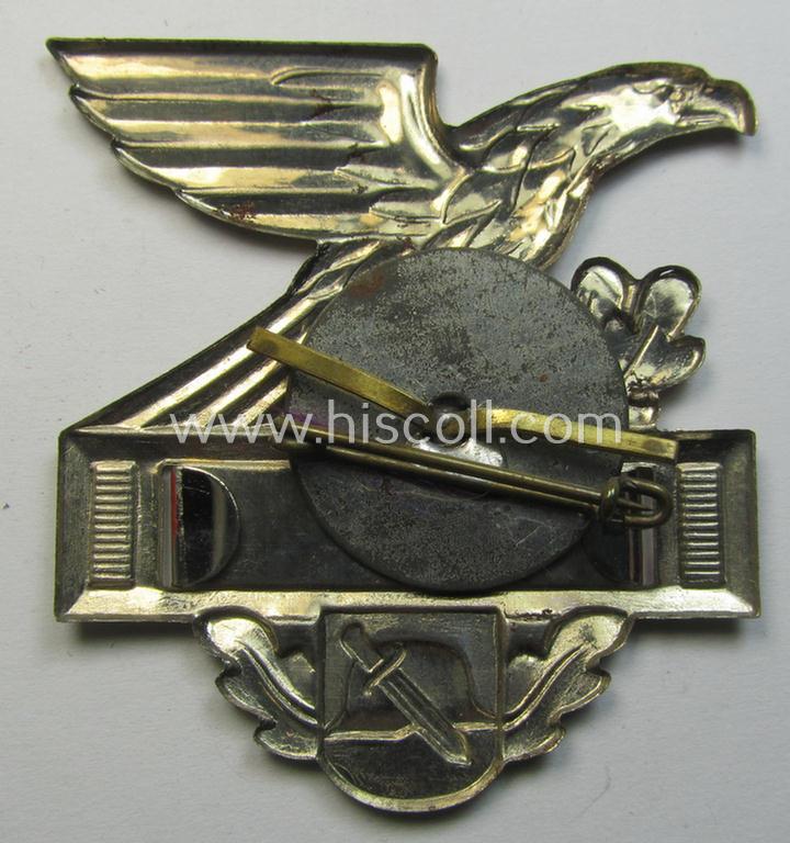 Commemorative, WHW- (ie. 'Winterhilfswerke'-) related 'tinnie' being a non-maker marked example depicting a 'Reichsadler', steel-helmet and sword and showing the text: 'Wehrfähig'