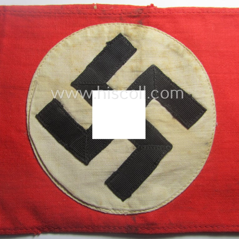 Moderately used- and/or worn, N.S.D.A.P.-related party-armband (ie. 'Armbinde') being of the 'non-woven'-pattern