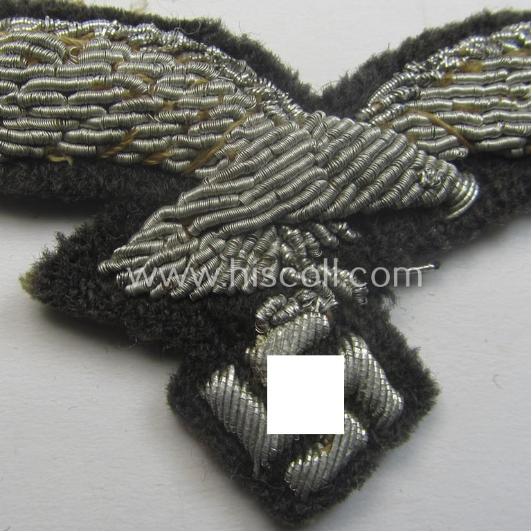 WH (Luftwaffe) officers'-pattern visor-cap-eagle (ie. 'Adler für LW-Offiziers-Schirmmütze') being a neatly hand-embroidered example of the: 'Extra Qualität' that comes in a moderately used- (ie. carefully cap-removed-), condition