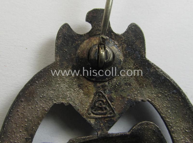 Moderately used 'Panzerkampfabzeichen in Silber' (or: silver-class panzer-assault badge or PAB) being a clearly maker- (ie. 'AS' in a triangle-) marked- and/or typical zinc- (ie. 'Feinzink'-) based specimen as was procuced by a to date unknown...