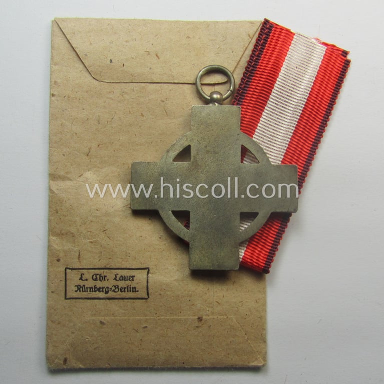 Fully complete, 'Feuerwehr-Ehrenzeichen der II. Stufe' that comes together with its period piece of ribbon (ie. 'Bandabschnitt') and (rarely seen!) period, 'Zellstoff'-based pouch as issued and/or recently found