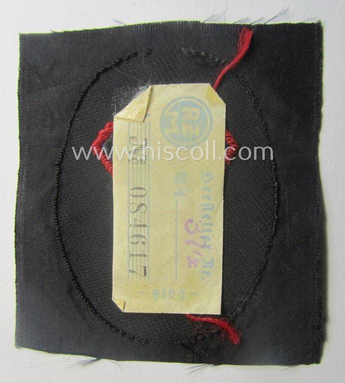 N.S.K.K.- (ie. 'National-Socialistisches Kraftfahr-Korps'-) related armbadge as was intended for an: 'N.S.K.K.-Sanitäts-Unterführer o. Mann' (ie. 'Feldscher') that still retains its 'RzM'-etiket