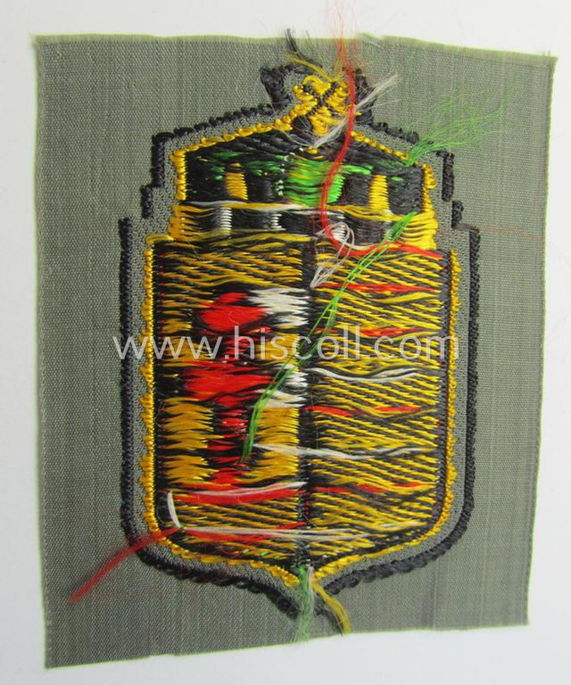 Attractive - and scarcely encountered! - German-produced, 'BeVo'-type armshield showing the coat of arms of Hungary (being a piece that was intended for a volunteer who served within the: 'Deutsche Wehrmacht')