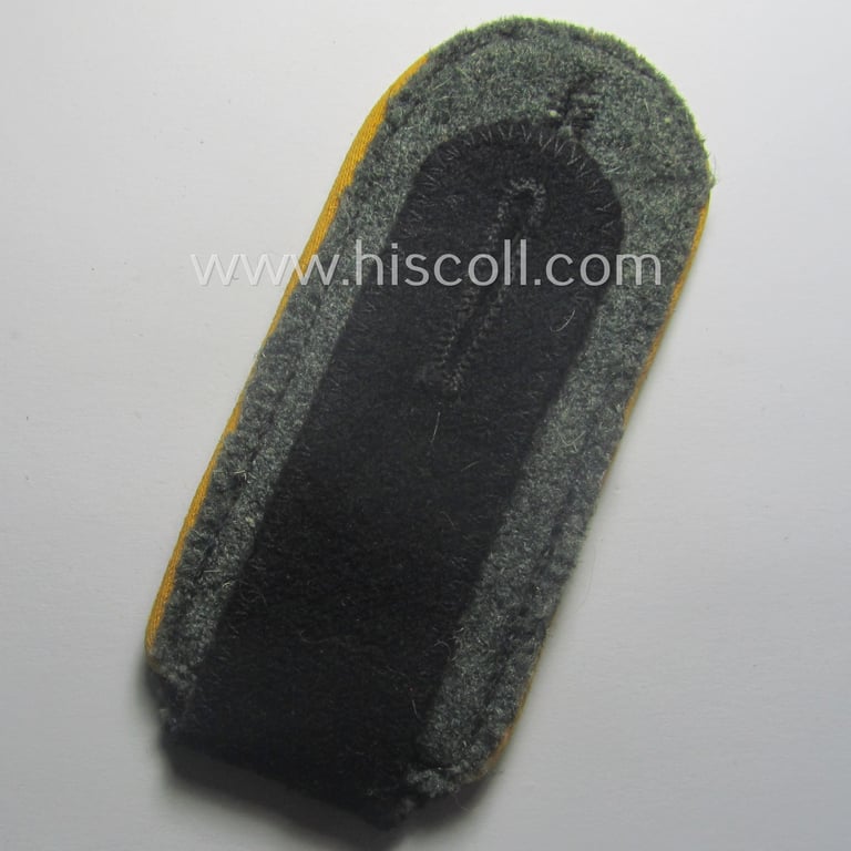 Single, Waffen-SS, EM-type shoulderstrap as piped in the golden-yellow-coloured branchcolour: 'SS-Mann der Kavallerie o. Aufklärungs-Trpn.'