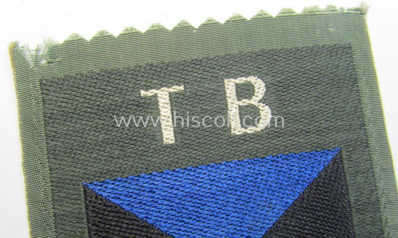 Eastern- ie. Russian volunteer (ie. Cossack-) related armshield as executed in the neat 'BeVo'-weave pattern depicting the interwoven 'Cyrillic' characters: 'TB' (as was intended for the Russian volunteers serving within the 'Terek Cossacks')