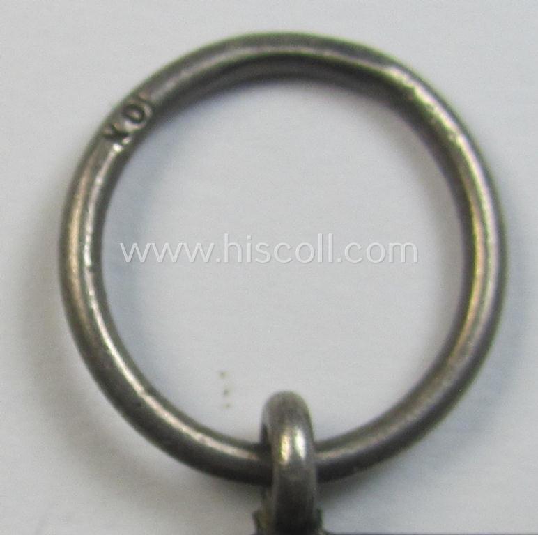 Attractive, WWI-period: 'Eisernes Kreuz II. Klasse' (or: iron cross second class) being a maker- (ie. 'KO'-) marked example that comes together with its (minimally) confectioned piece of ribbon (ie. 'Bandabschnitt')