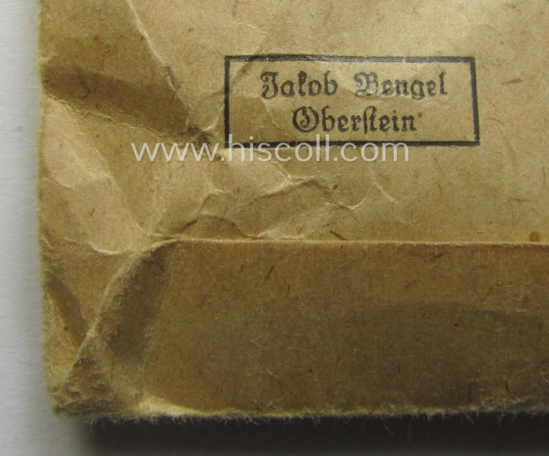 'Ehrenkreuz der deutschen Mutter - dritte Stufe' (or: bronze-class mothers'-cross) that came mounted onto its long-sized ribbon and that came stored in its period pouch (by the maker: 'Jakob Bengel - Oberstein')