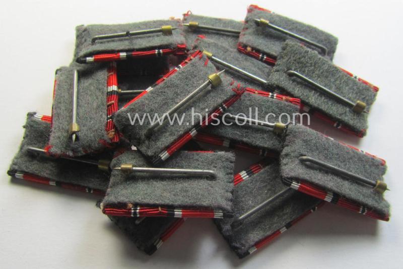 Neat - and simply never issued- nor worn! - dual-pieced WWII-period ribbon-bar (ie. 'Feld- o. Bandspange') as was intended for combination: 'Eisernes Kreuz II. Kl.' and: 'Ost'-medal (ie. 'Medaille Winterschlacht im Osten 1941-42')