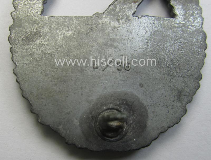 WH (Kriegsmarine) 'Marine-Artillerie-Abzeichen' being a clearly maker- (ie. 'L/56'- thus by: 'Funcke & Brüninghaus'-) marked and/or zinc- (ie. 'Feinzink'-) based example