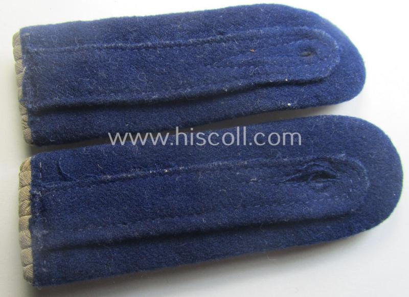 Pair of 'cyphered', WH (Heeres) officers'-pattern shoulderboards as piped in the darker-blue-toned branchcolour as was specifically intended for a: 'Hauptmann u. Arzt einer Sanitäts-Abtlgs.'