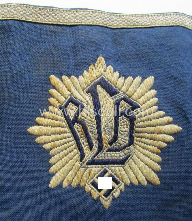 Superb - and actually scarcely found! - darker-blue-coloured RLB (or: 'Reichsluftschutzbund') so-called: 'Amtsträger Armbinde für Führer' depicting the typical 'RLB'-logo (with lettering) and that comes in a moderately used- ie. worn, condition