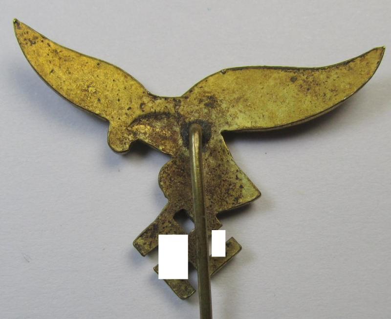 Bright-golden-toned lapel-pin (ie. 'Zivilabzeichen') to be worn on the civil attire as was intended for usage by the various staff-members of the 'Luftwaffe' (depicting an early-pattern- ie. 'down-tailed'-eagle)