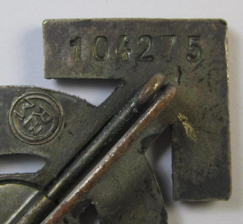 Neat, HJ/BDM- (ie. 'Hitlerjugend'/'Bund Deutscher Mädel'-) so-called: 'Leistungsabzeichen in Silber' being a neatly maker- (ie. 'RzM M1/34'-) marked example that is bearing the unique bearers'-number: '104275'