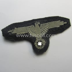 'Clearly used- and/or carefully tunic-removed ie. cut-out off...