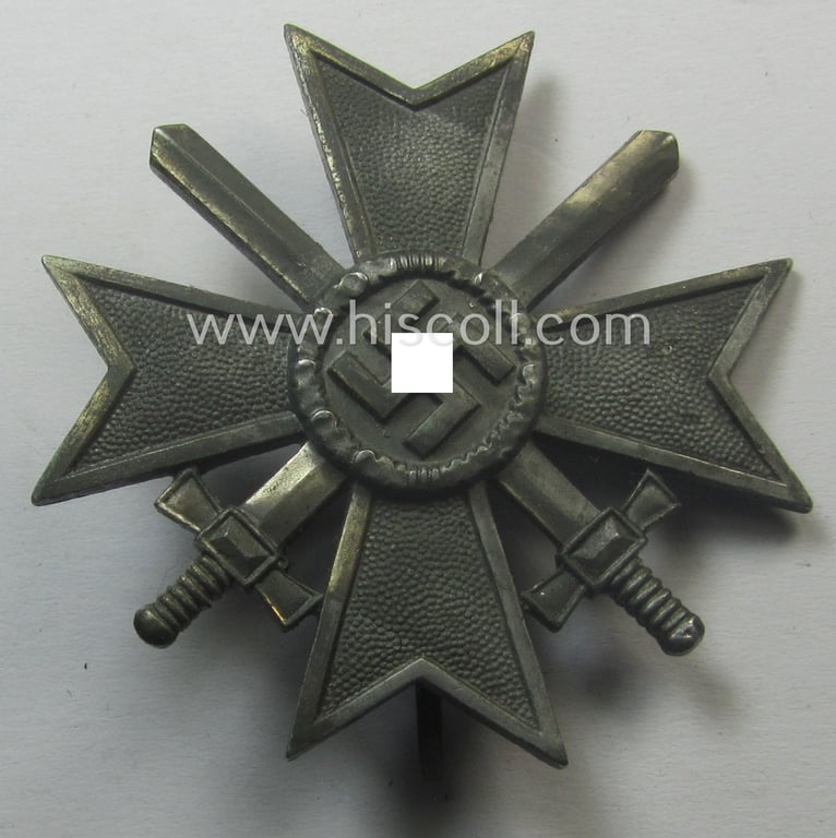 'Kriegsverdienstkreuz 1. Klasse mit Schw.' being a maker- (ie. '3'-) marked (and/or 'Feinzink'-based) specimen by the maker: (ie. 'Hersteller') 'Wilh. Deumer' that comes stored in its original, simplified 'KvK'-etui