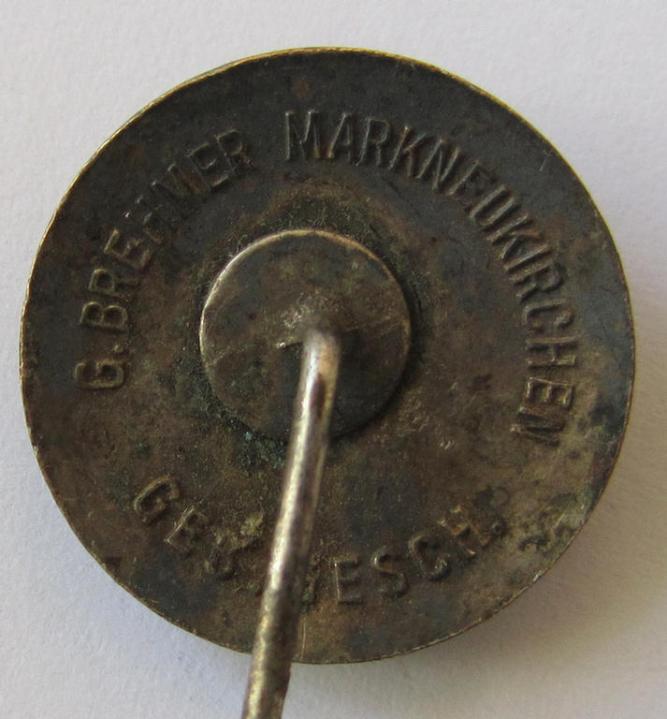 Attractive, semi-enamelled, so-called: RLB- (ie. 'Reichluftschützbund') 'Amtsträgerabzeichen' or: civil-attire badge (of the first pattern), bearing a neat makers-mark ('G. Brehmer') and patent-pending- (ie. 'Ges.Gesch.'-) marking on its back