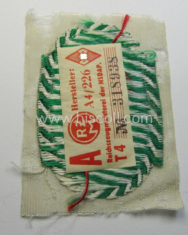 Attractive - and very scarcely encountered! - HJ/BDM (ie. 'Hitlerjugend'/'Bund Deutscher Mädel') trade- or specialist-armbadge as executed in neat 'BeVo'-weave pattern as was intended for a: 'Gefolgschaftsfeldscher'