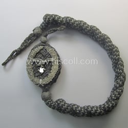 WH (Luftwaffe) 'Schützenschnur' (ie. shooting-lanyard) being an example...