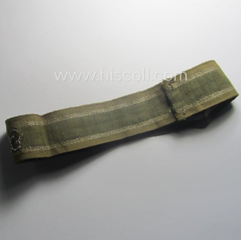 Minimally worn, 'BeVo'-like cuff-title (ie. 'Ärmelstreifen') entitled: 'Afrikakorps' being a with certainty issued example that comes in an overall very nice- (ie. non-shortened- and/or once tunic-attached-), condition