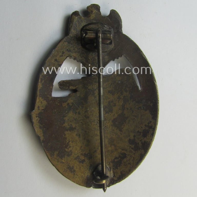 'Panzerkampfabzeichen in Bronze' (or: bronze-class panzer assault-badge or PAB) being a zinc- (ie. 'Feinzink'-) version (having a so-called: 'horizontal-crimp-set-up') as was procuced by the: 'Steinhauer u. Lück' (ie. 'S.& L.') company