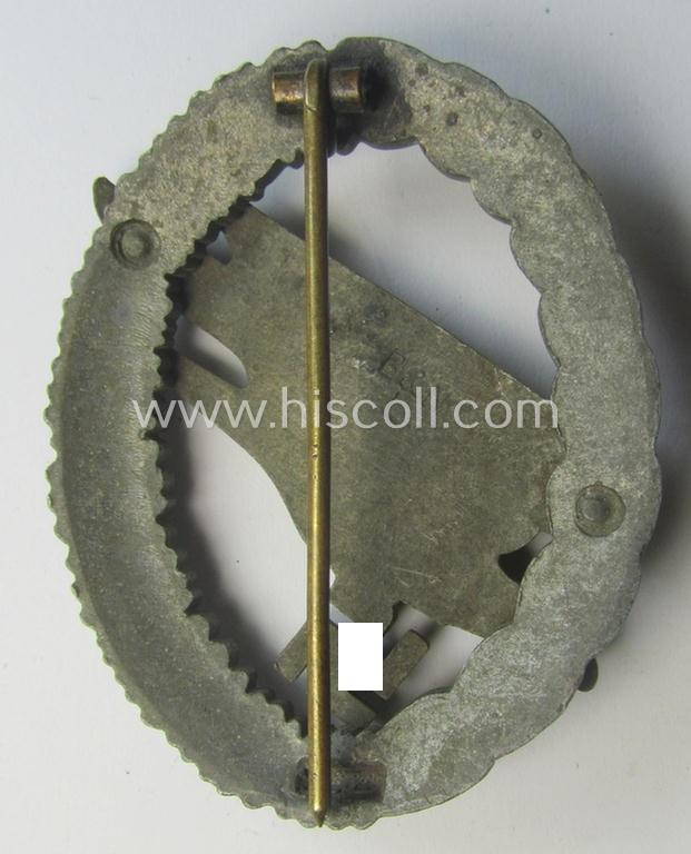 Regrettably incomplete, WH (Luftwaffe) 'Fallschirmschützen-Abzeichen' (or: paratroopers-jumpbadge) being a neatly maker- (ie. 'B&N - L'-) marked- and typical zinc- (ie. 'Feinzink'-) based example by the maker: 'Berg u. Nolte'