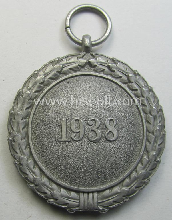 Neat, 'Luftschutz-Ehrenzeichen 2. Stufe' being a non-maker-marked example, as executed in (heavy) zinc-based metal (ie. 'Feinzink') and that came together with its period ribbon ie. 'Bandabschnitt'