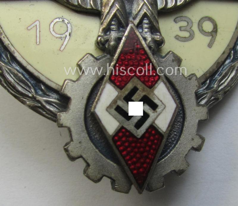 'Buntmetall'-based, 'HJ'- (ie. 'BDM'-) related so-called: 'Reichsberufswettkampf-Siegerabzeichen' (of the 2nd model) entitled: 'Gausieger 1939' and being a neatly maker- (ie.: 'G. Brehmer'-) marked example