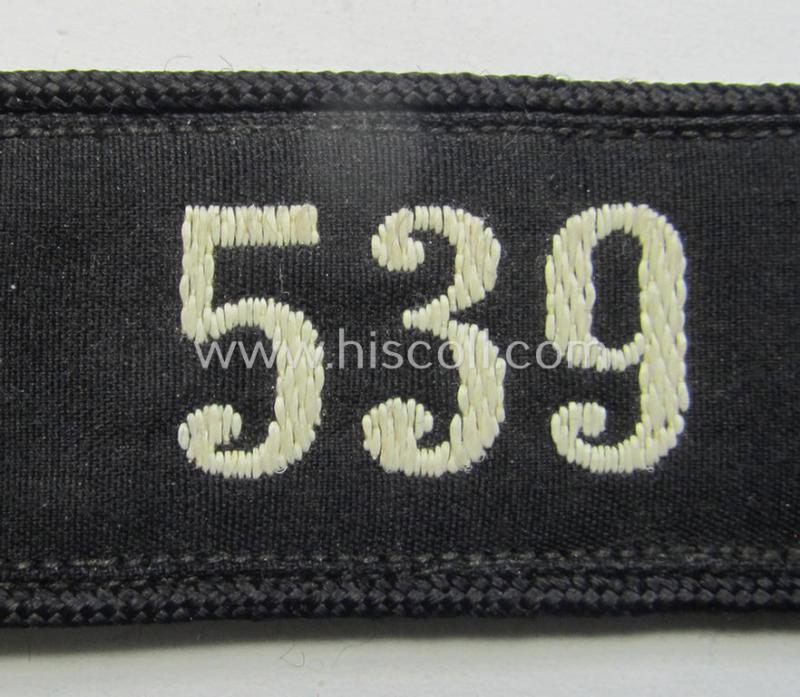 Neat - and naturally single! - black-piped 'DJ- o. Deutsches Jungvolk' shoulderstrap as was intended for usage by a: 'DJ-Mitglied' who served within the: 'Bann 539' (539 = 'Vöcklabruck') and that comes with its period-attached 'RzM'-etiket