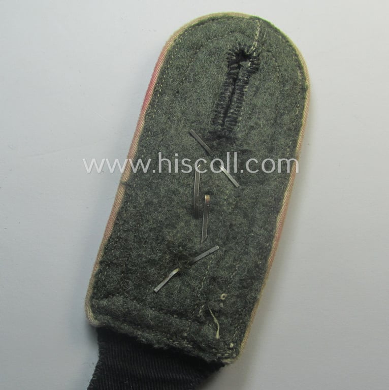 Superb, single Waffen-SS NCO-type (and neatly 'cyphered'!) shoulderstrap as piped in the white-coloured branchcolour as intended for usage by an: 'SS-Hauptscharführer' who served within the: SS-Rgt. 'Westland' ('5. SS-Pz-Gren.-Div. "Wiking")
