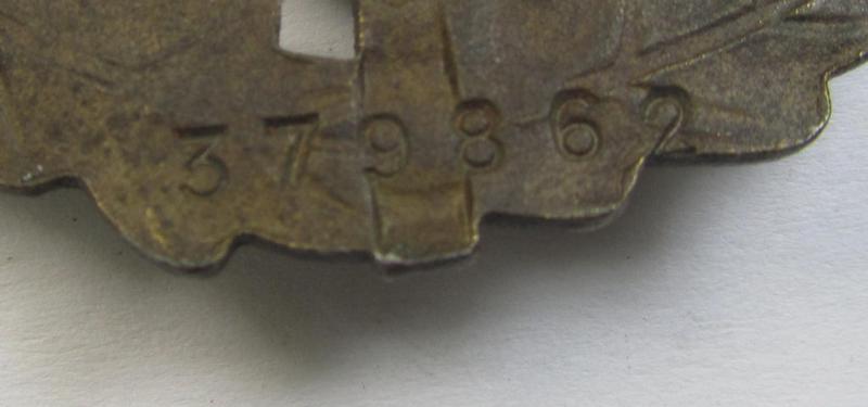 Early- (ie. pre-) war-period 'SA Sportabzeichen in Bronze' being a nicely maker- (ie. 'E. Schneider'-) marked example that bears a unique, stamped bearers'-number that reads: '379862' on its back