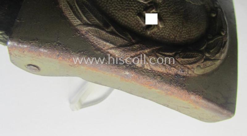 Rarely found WH (Luftwaffe) 'tropical-issued' belt-buckle being a non-maker-marked, beige-tan-coloured example that comes mounted onto its original, greenish-coloured- (and/or: 'webbing'-based-) tab