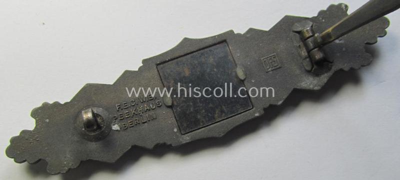 Superb, 'Nahkampfspange in Bronze' (or: bronze-class close-combat clasp ie. CCC) being a neatly maker-marked- and/or minimally converse-shaped specimen as was produced by the: 'JFS'- (ie. 'Joseph Feix u. Söhne'-) company