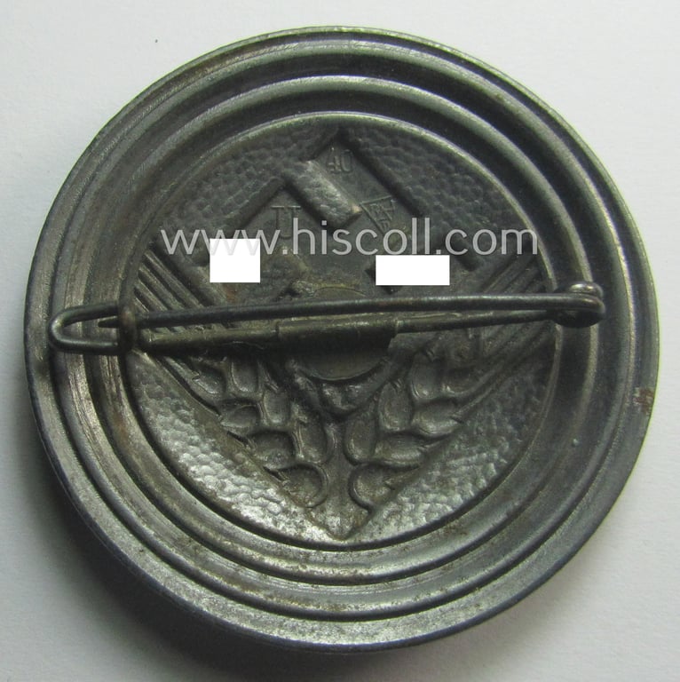 'Reichsarbeitsdienst der weiblichen Jugend' (or: RADwJ ie.: Womens Labor Service) so-called: 'Brosche für Kameradschaftsältesten' being a clearly maker- (ie. 'U'-) marked and/or: '1940'-dated example
